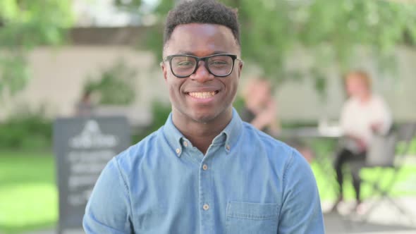 Portrait of African Man Shaking Head As Yes Sign