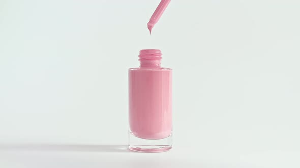 Foundation for Face Concealer Cosmetic Liquid Foundation Drips From a Pipette Into a Bottle