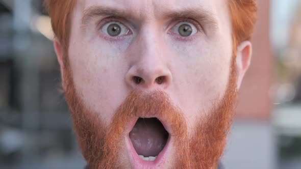 Close Up of Shocked Face of Beard Young Man Face