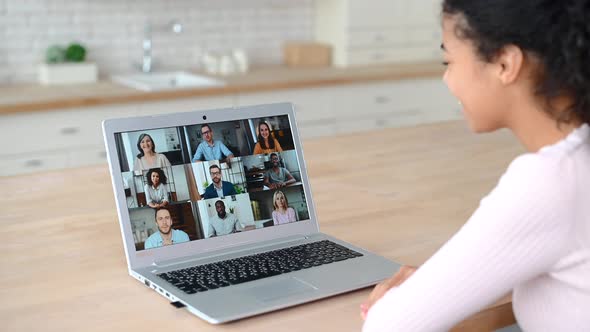 An AfricanAmerican Woman Using a Laptop for Video Meeting