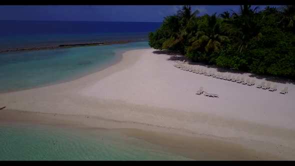 Aerial nature of luxury sea view beach wildlife by blue sea with white sandy background of a dayout 