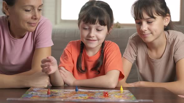 Children and Adult with Board Game