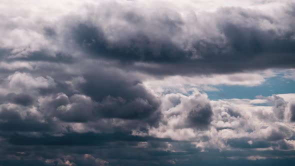 Timelapse of Gray Cumulus Clouds Moves in Blue Dramatic Sky Cirrus Cloud Space