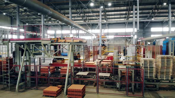 Big Factory Room with Working Equipment