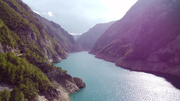 Aerial View of Sky Blue River in Sunny Rays