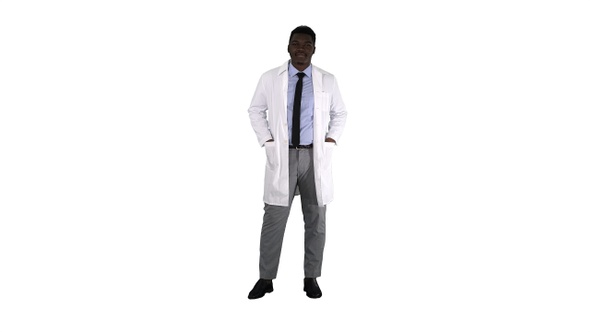 Male African Doctor Standing With Hands In His Pockets