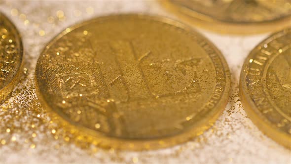 Sparkles Scatter From Coin Belonging to Litecoin System Macro