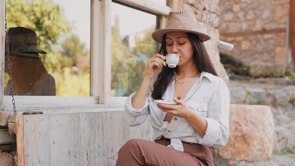 Woman Drinking Turkish Coffee Outdoors