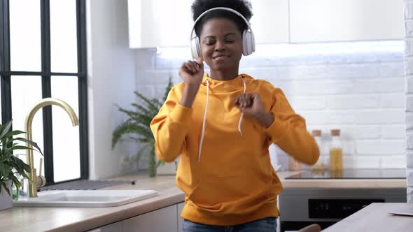 African American Black Handsome Woman Dancing with Headphones Enjoy Life Listening Favourite Music