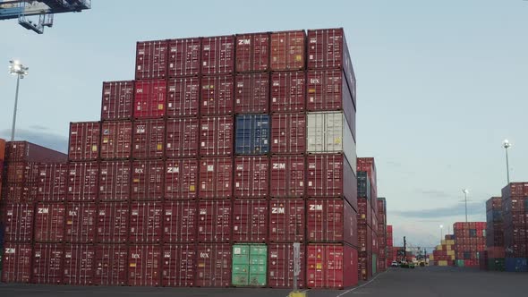 Shipping Containers Stacked On Husky Terminal In Port Of Tacoma, Washington, USA. Slide Shot