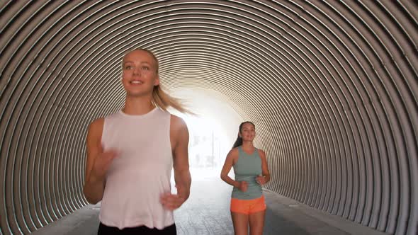 Young Women or Female Friends Running Outdoors