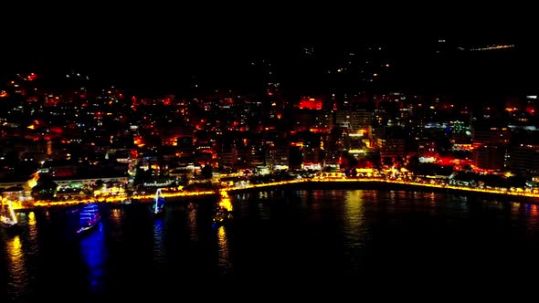 Beautiful Aerial View of the City of Saranda at Night in AlbaniaAlbanian Riviera