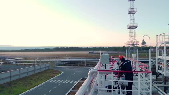 A Worker in the Oil and Gas Industry Far From Civilization in the Oil and Gas Field