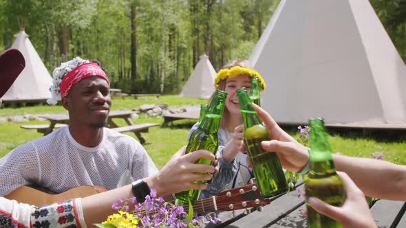 Friends Clinking Fresh Drinks Outdoors