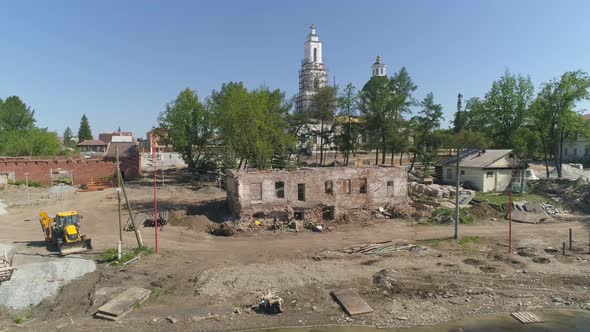 Aerial view of reconstruction of the area next to the church and pond 21