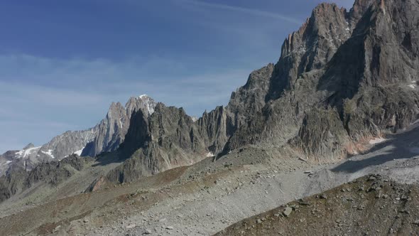 Low aerial over rocky mountain slope