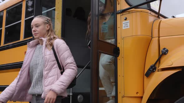 Diverse High School Students Leaving School Bus