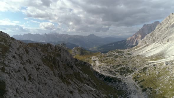 Aerial of Valley in the Italian Dolomites with an Empty Road