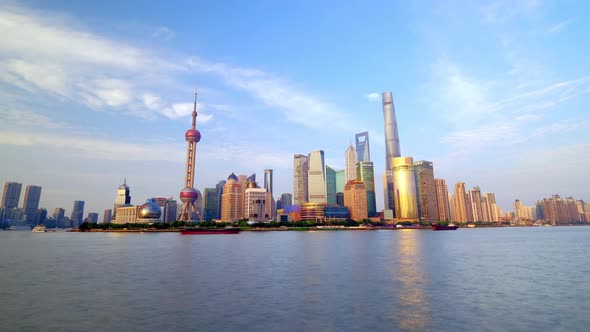 Shanghai skyline time lapse at Pudong district, Shanghai, China on a sunny day.