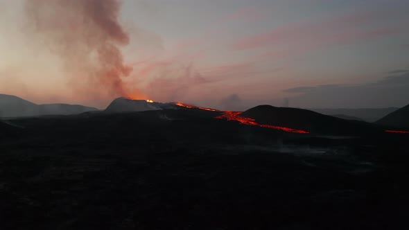 Forwards Fly Over Volcanic Landscape at Dawn