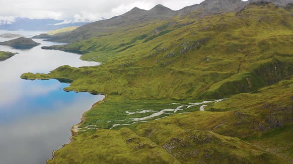 Aerial view of the coastline near Anderson Bay, Unalaska, Alaska, United States.