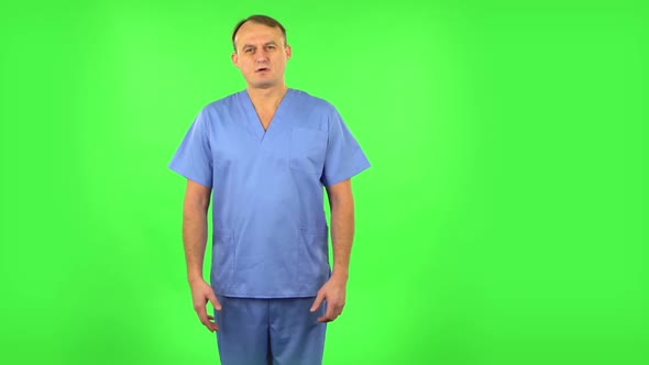 Medical Man Disappointedly Waves His Hands and Says Oh My Good. Green Screen