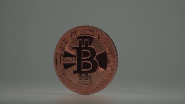 New Digital Decentralizes Currency Bitcoin BTC Rotate on the Table with White Background