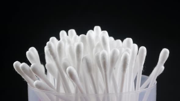 White cotton-tipped swabs. Ear sticks close up.