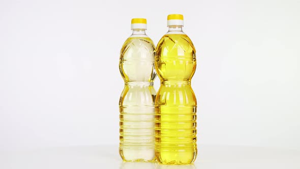 Close-up, Vegetable Refined and Unrefined Sunflower or Corn Oil in Plastic Bottles, Food Products