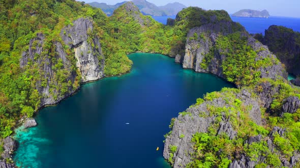 Fly Around the Rocky Mountains with Beautiful Lagoons and Turquoise Sea in El Nido, Palawan