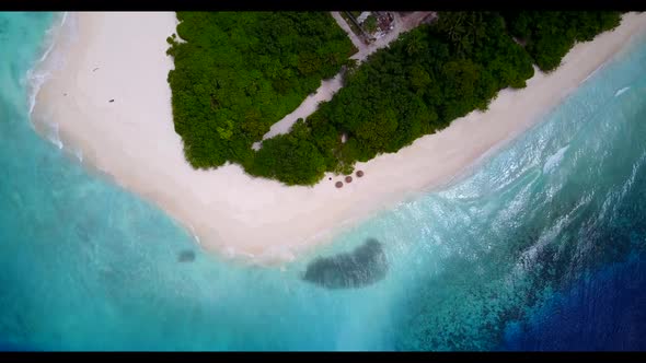 Aerial flying over texture of beautiful coastline beach holiday by blue sea with white sand backgrou