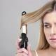 Angry Woman Using Curling Iron - VideoHive Item for Sale