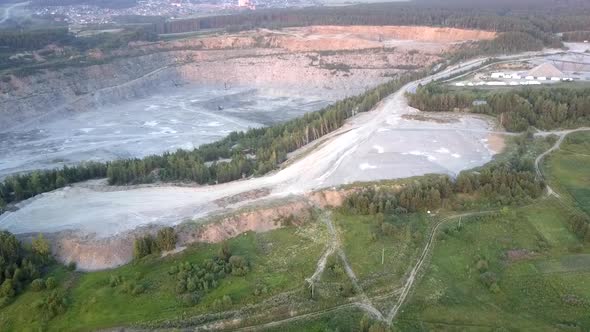 Huge Gravel Mining Factory with Grey Barrows and Quarry