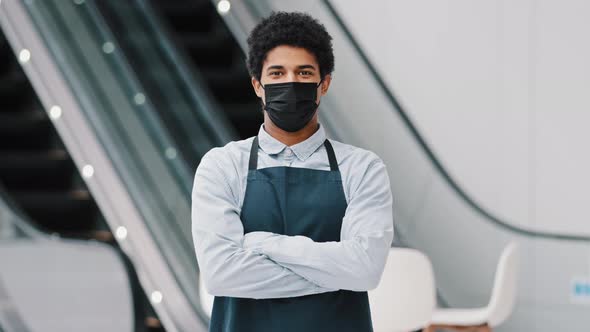 African American Man Guy Restaurant Cafe Male Worker in Medical Mask Looking Camera Posing Crossing