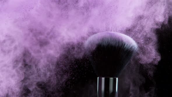 Super Slow Motion Shot of Makeup Brush and Purple Powder Shake at 1000 Fps