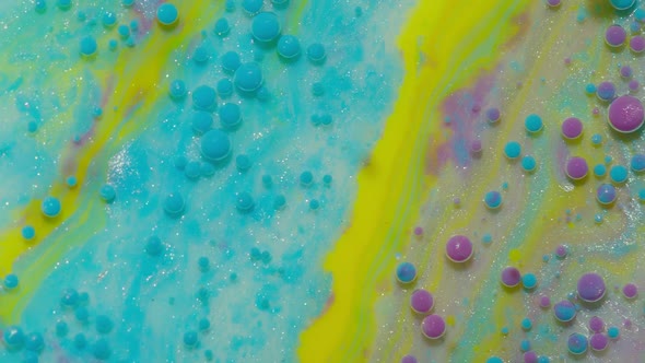 Macro Structure of Multicolored Water Paint Oil Bubbles Movement Bright Colorful Acrylic Painting