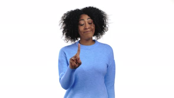 Portrait of Serious African Woman Showing Rejecting Gesture By Stop Finger Sign