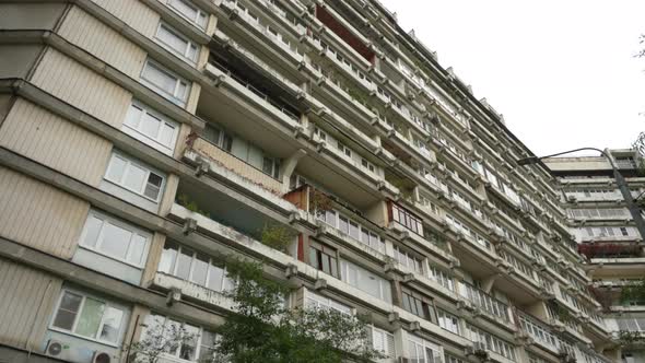The Facade of a Highrise Residential Building with Unusual Balconies