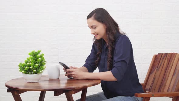 Indian girl chatting with someone