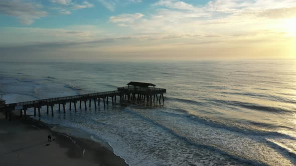 Tybee Beach Pier At Sunset On Tybee Island, Georgia - aerial drone shot