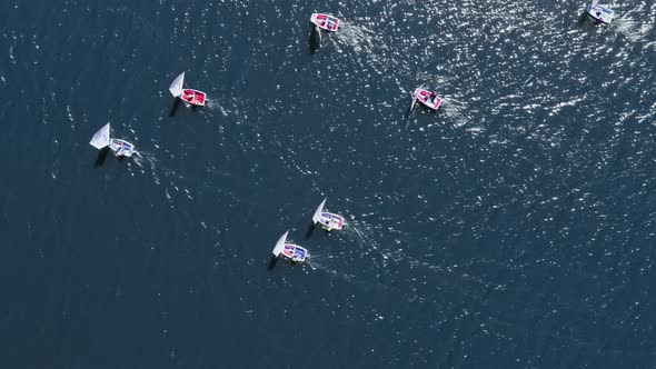 Aerial view of sailing boats on lake during the competition