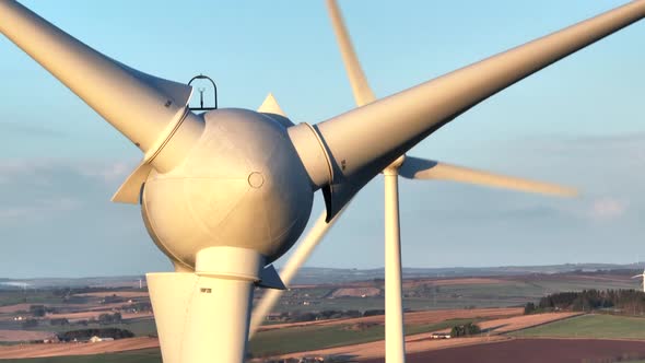 Wind Farm Turbines at Sunset Generating Renewable Power