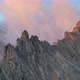 Dolomites mountains peaks with a hiking path on a summer sunrise - VideoHive Item for Sale