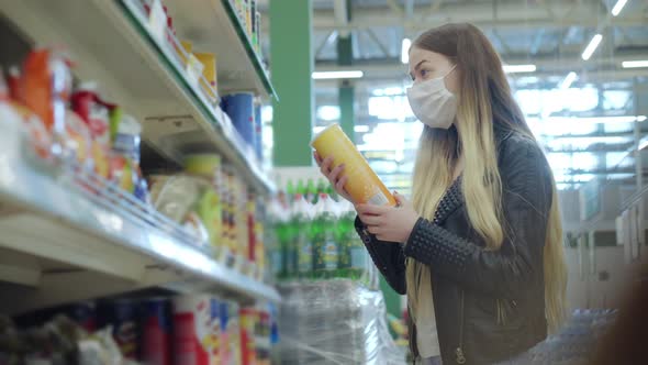 Young Woman in Medical Mask Buying Chips in Grocery Store