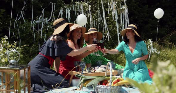 Young Girls Have Fun Celebrating A Birthday, Relaxing And Rejoicing.