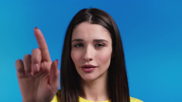 Portrait of Serious Woman Showing Rejecting Gesture By Stop Finger Sign