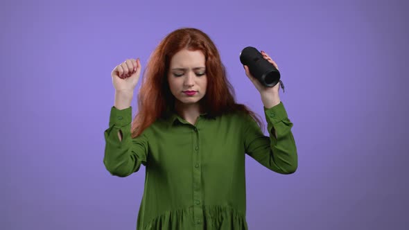 Woman Listening to Music By Wireless Portable Speaker  Modern Sound System