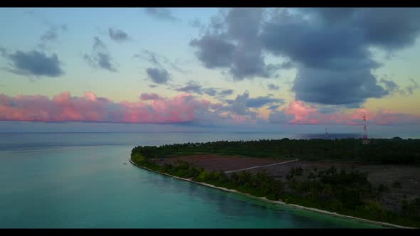 Aerial flying over travel of beautiful bay beach journey by blue water and white sandy background of