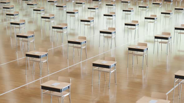 Aerial view of endless rows of desks with chairs. School qualification exam.Test