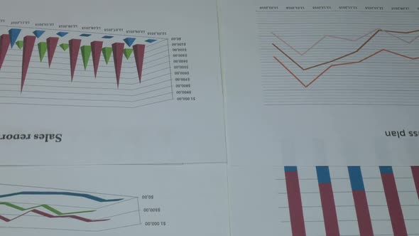 Business Chart On The Desk In A Modern Office